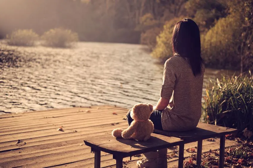 Women sitting alone, Best Ways to Cope with Loneliness