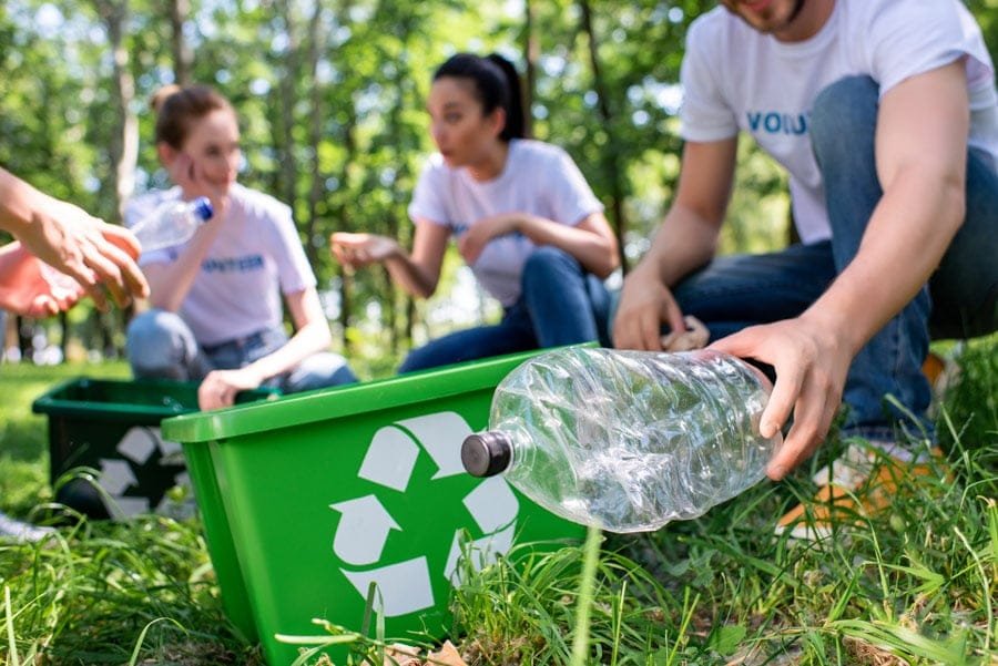 people doing community waste cleaning and Recycling Right