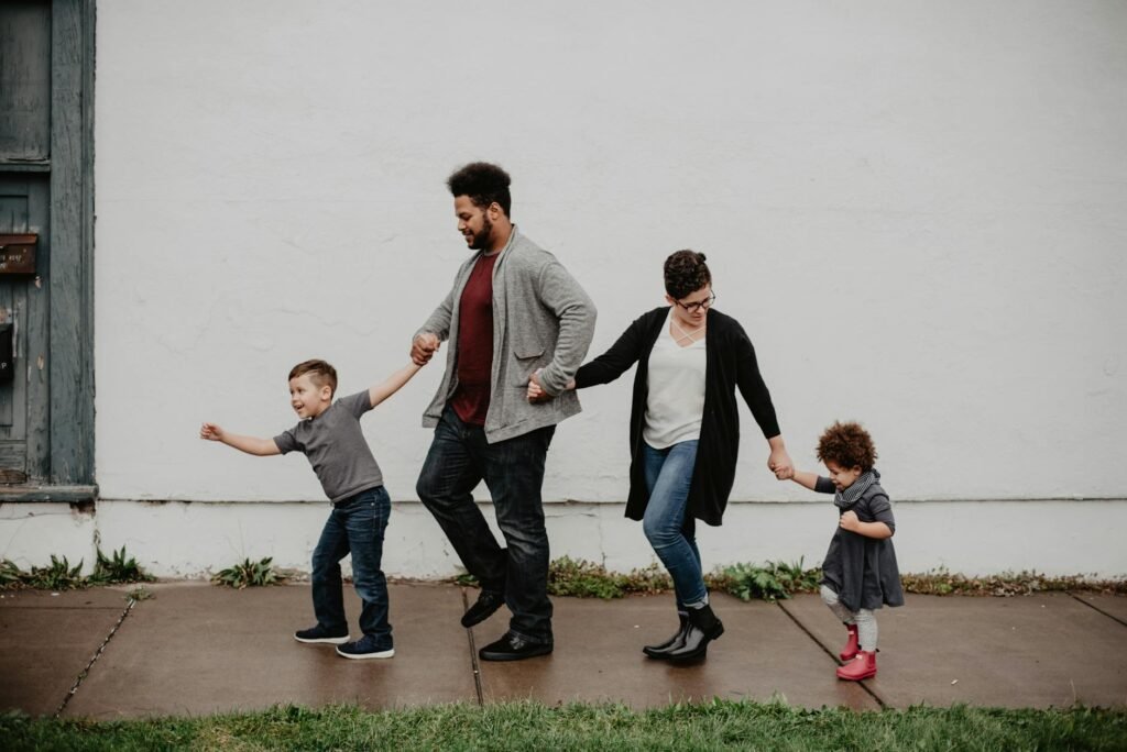 family of four walking at the street Marriage