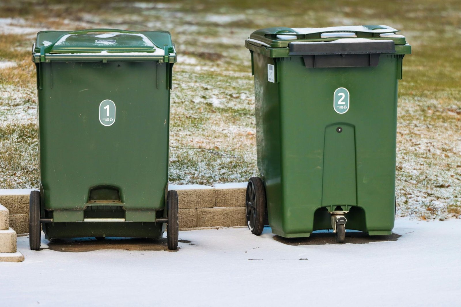green garbage bins in snowy jonkoping yard Recycling Right Boosts Your Health