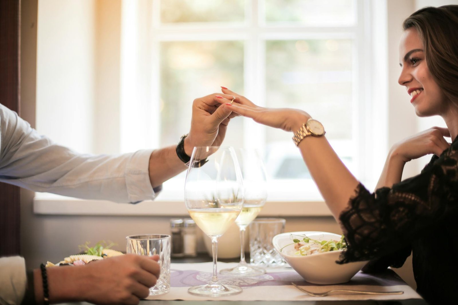 crop man making proposal in luxurious restaurant during dinner