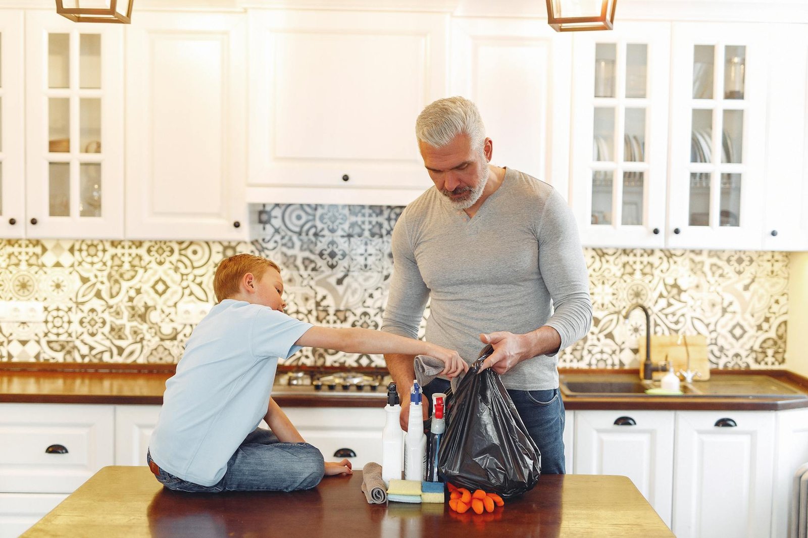father and son preparing for cleaning - Common Asthma Triggers