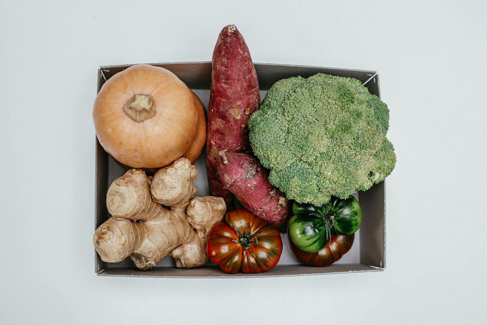 fresh fruits and vegetables in a box