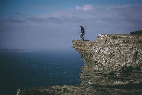man standing on a cliff effects of Being Single