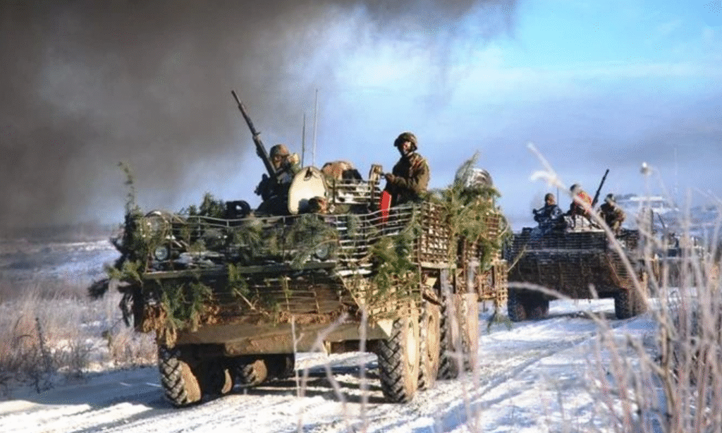 Battle of Avdiivka - Troops moving in an armoured vehicle and tanks