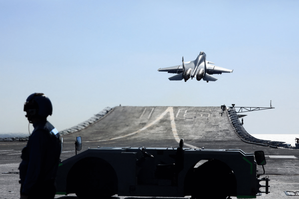 aircraft taking off from aircraft carrier deck